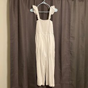 White Jumper. Built in shorts.